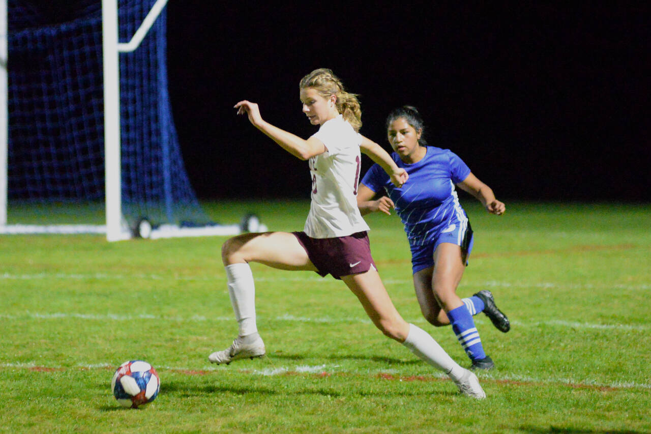 DAILY WORLD FILE PHOTO Montesano forward Mikayla Stanfield, left, is marked by Elma Defender Diana Guzman during a game earlier this season. Stanfield led the 1A Evergreen League in goals this season and was named League MVP last week. Guzman was named a First Team All-League defender.