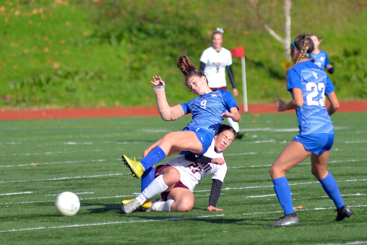 RYAN SPARKS | THE DAILY WORLD Montesano’s Jaiden King (23) is called for a foul against La Center’s Emma Seter (9) during the first half of the Bulldogs 2-1 loss in the 1A District 4 Championship game Saturday in Vancouver.