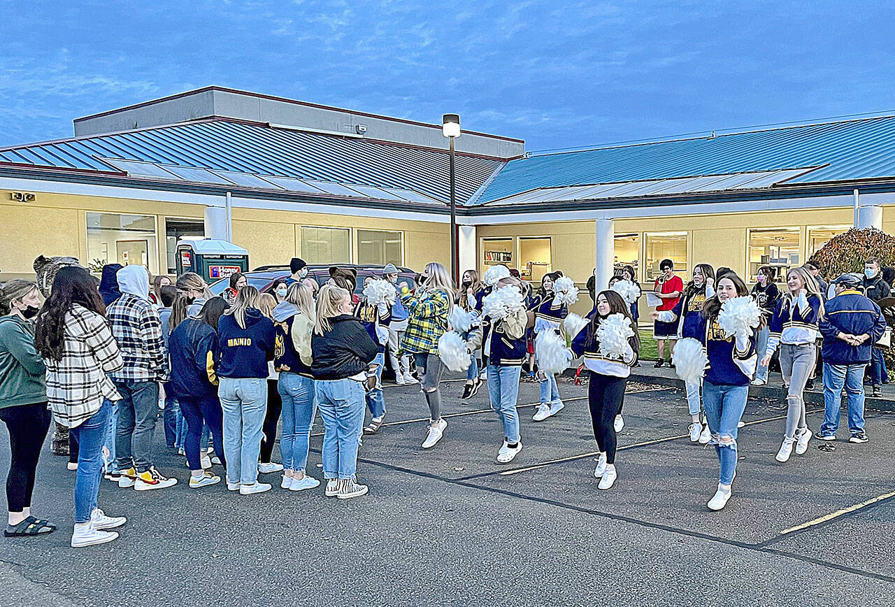 Aberdeen High School cheerleaders and marching band perform while the final Food Ball tally is calculated on the evening of Monday, Nov. 8. (Courtesy Coastal Harvest)