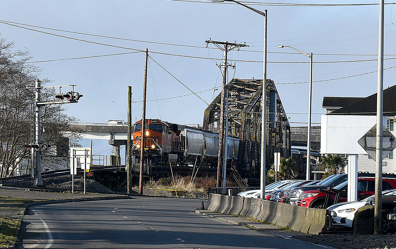 DAN HAMMOCK | THE DAILY WORLD 
An eastbound train heads into East Aberdeen. A massive project to separate the rail and vehicle traffic in the often-congested area got a shot in the arm in the form of a $2 million federal grant to complete project planning.
