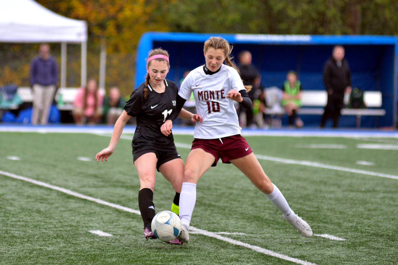 RYAN SPARKS | THE DAILY WORLD Montesano’s Mikalyla Stanfield (10) battles for possession with Klahowya’s Gabriella Dickey during Monte’s 5-0 loss in the state’s third/fourth-place game on Saturday at Shoreline Stadium in Shoreline.