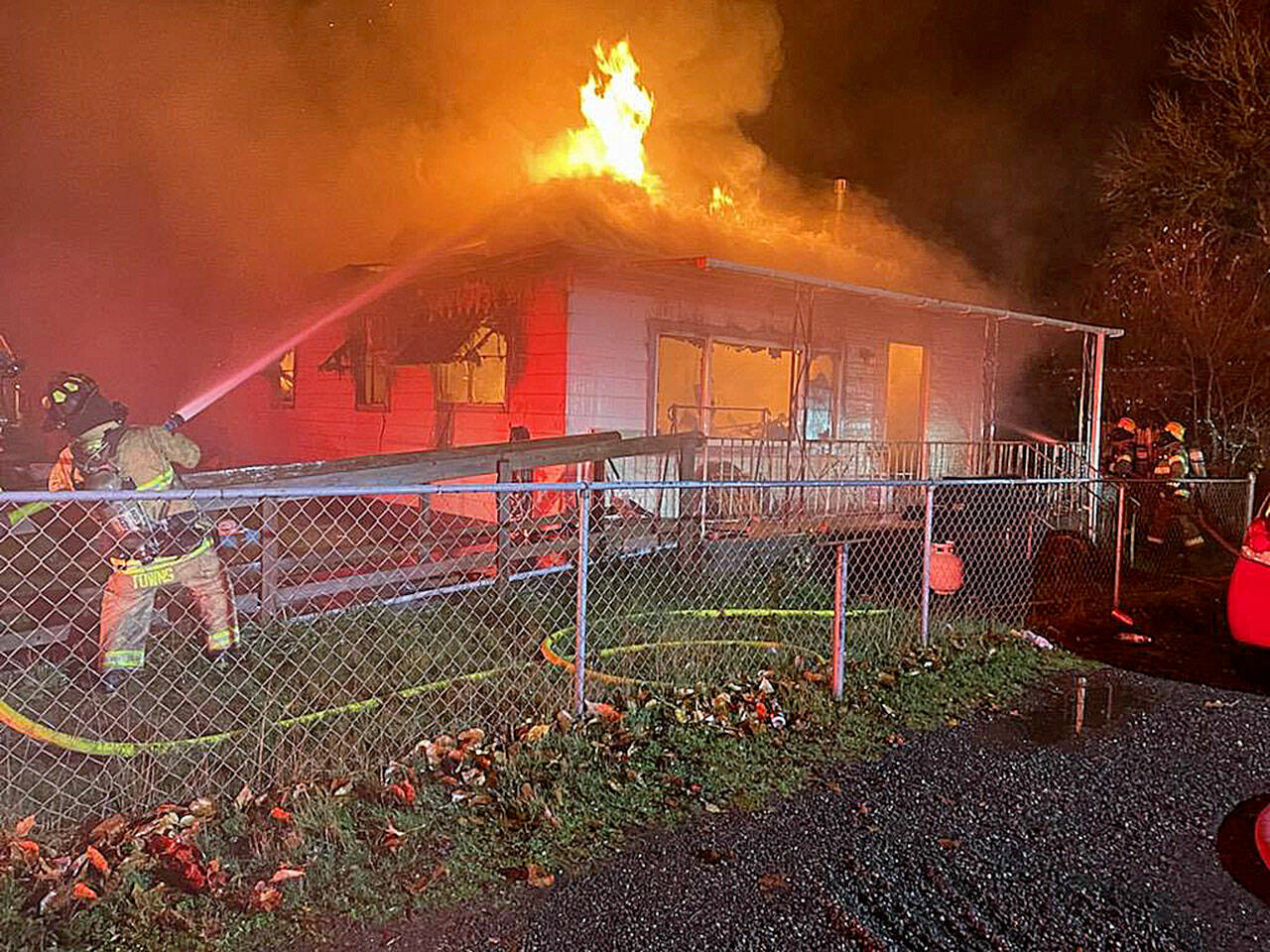 Courtesy of Grays Harbor Fire District 5 
Crews from multiple agencies battled a fully-involved structure fire on Mox Chehalis Road in Malone early Friday morning, Nov. 26, 2021.