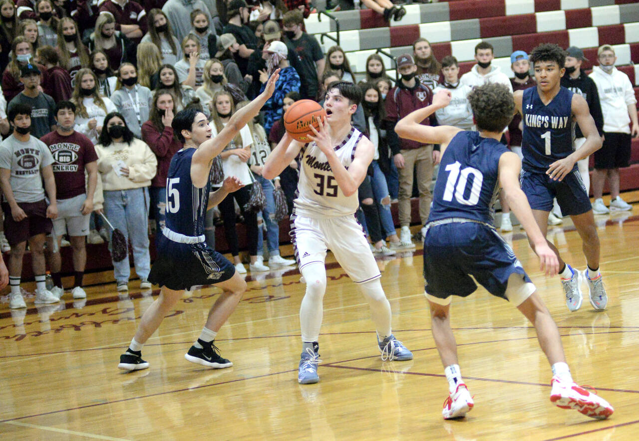 RYAN SPARKS | THE DAILY WORLD
Montesano Caydon Lovell (35) looks to shoot against King's Way Christian's Alex Fulton (15) during the Bulldogs 62-30 loss on Friday in Montesano.