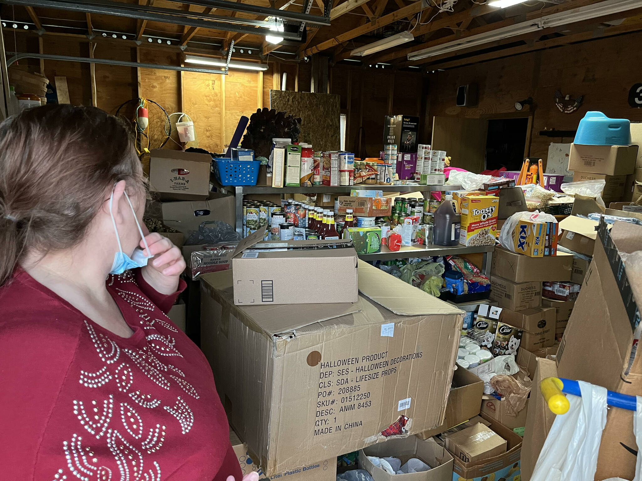 Matthew N. Wells | The Daily World 
Connie Airey, who has a garage full of food for her food-gifting site that she hosts in front of her house, talked about the different options she has for people. She knows people need a variety of food to not just survive, but to live.