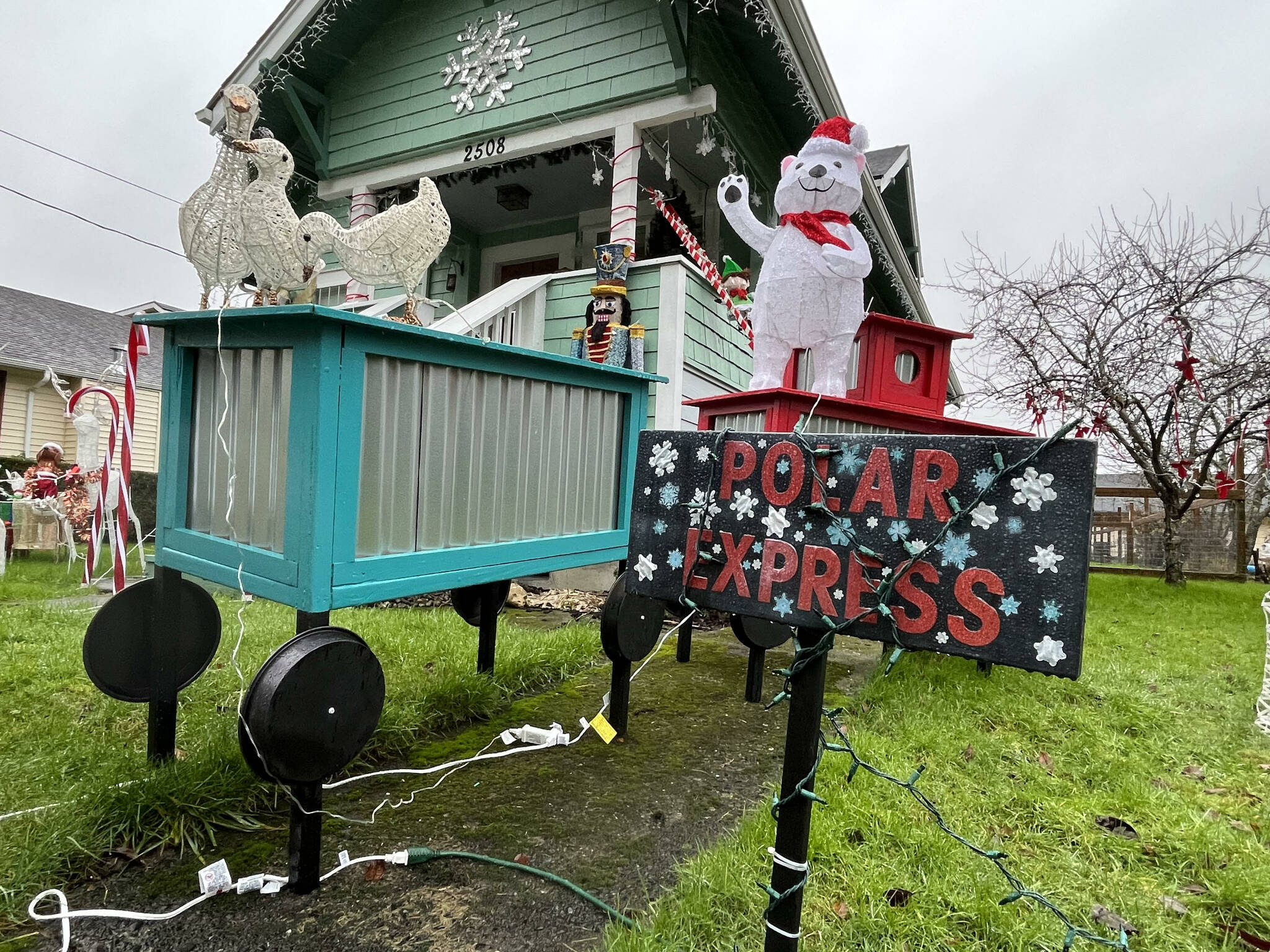 Michele Crane's "Christmas Wonderland" in the 2500 block of Queets Avenue, in Hoquiam, features a variety of Christmas classics, such as the "Polar Express." The friendly polar bear and geese atop the hand-built train cars greet passersby.