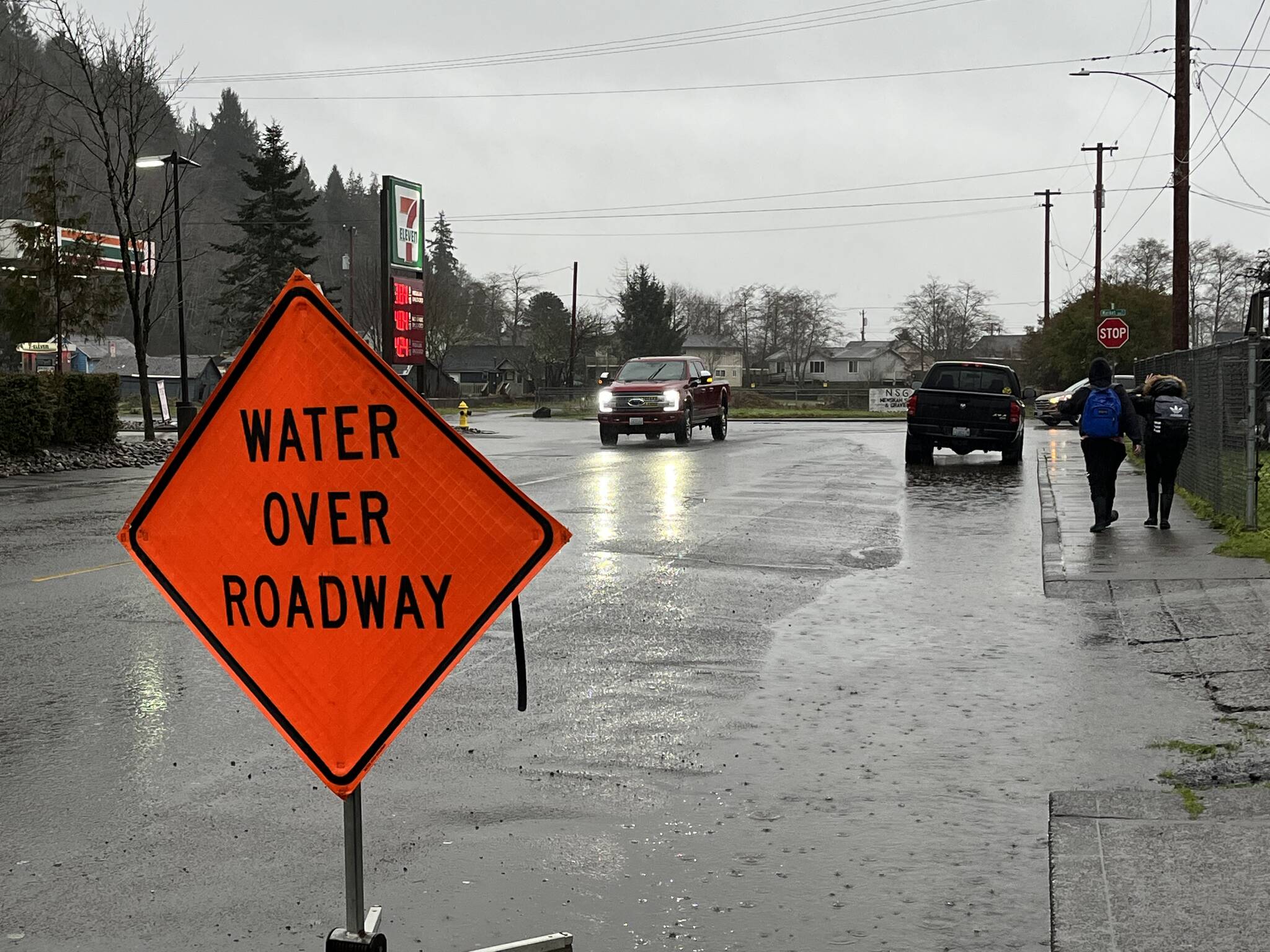 The area just before the intersection and at the intersection of B Street and Market St., was covered with water to the point where cars were making wakes during their morning drives into work on Thursday, Jan. 6, 2022. Matthew N. Wells | The Daily World
