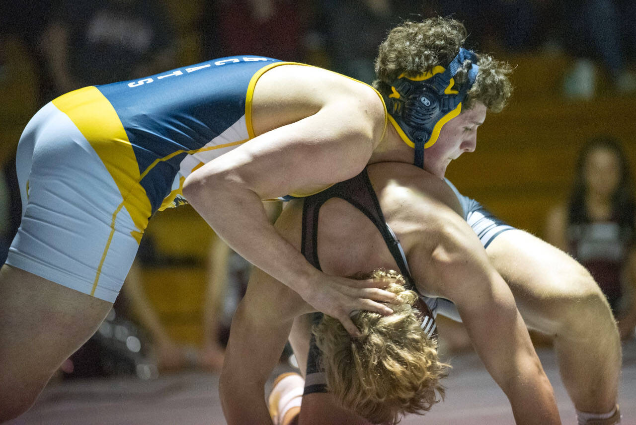 ERIC TRENT | THE CHRONICLE Aberdeen’s Liam Heikkila, left, controls WF West’s Brock Guyette during a 195-pound class match at a dual meet on Wednesday in Chehalis.