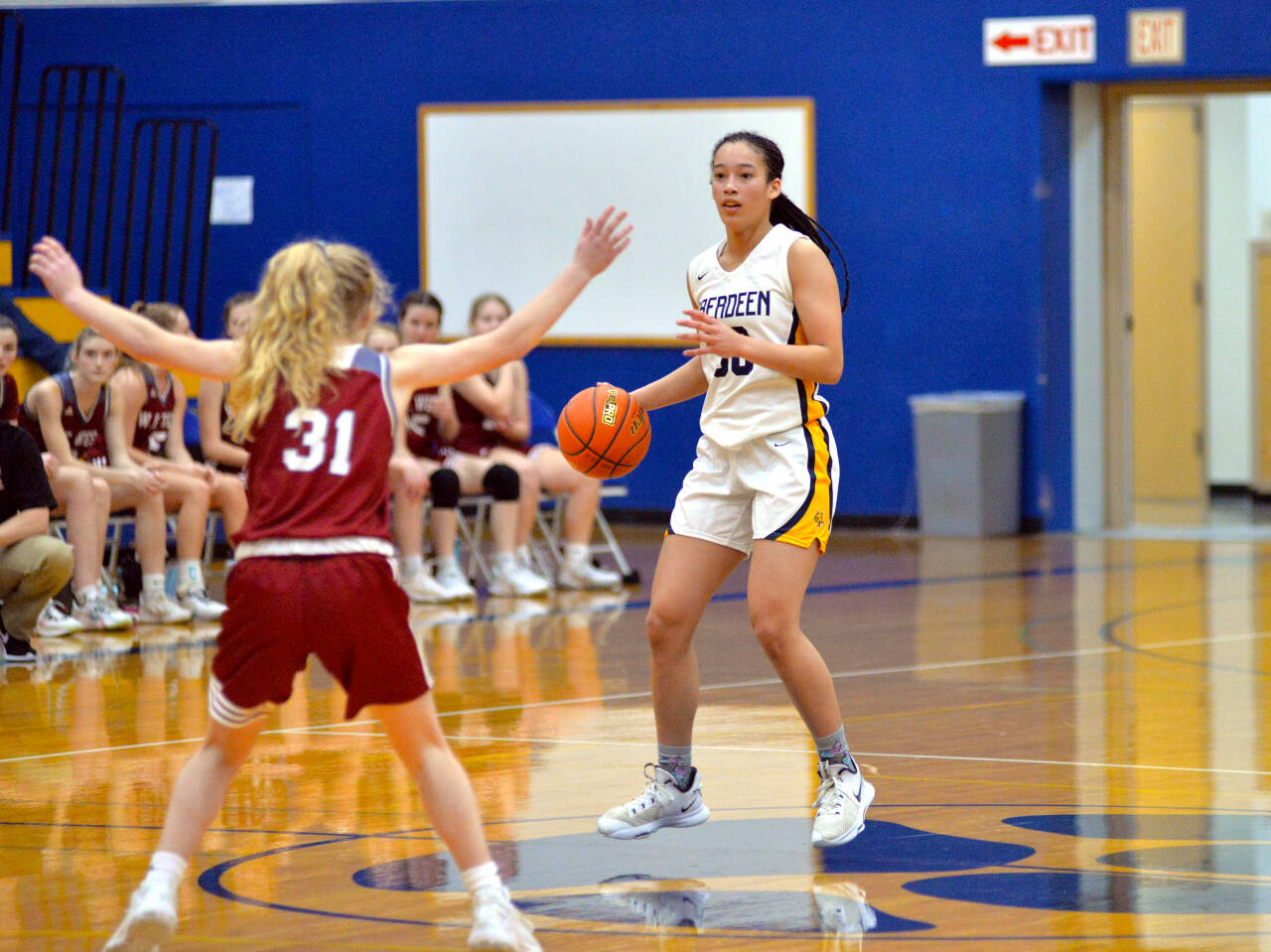 RYAN SPARKS | THE DAILY WORLD Aberdeen guard Maddi Gore reads the floor during Aberdeens 66-28 loss to WF West on Tuesday in Aberdeen. Gore led the Bobcats with 13 points.