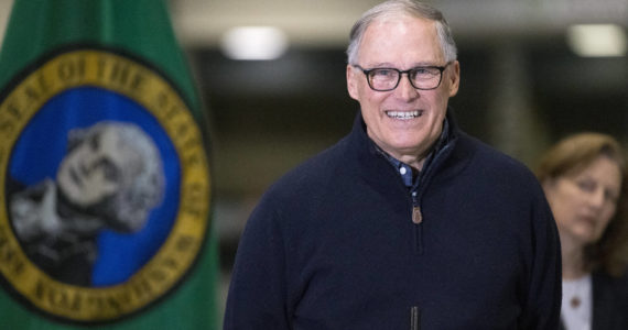 Karen Ducey | Getty Images | TNS
Washington state Gov. Jay Inslee and other leaders speak to the press in Seattle on March 28, 2020.