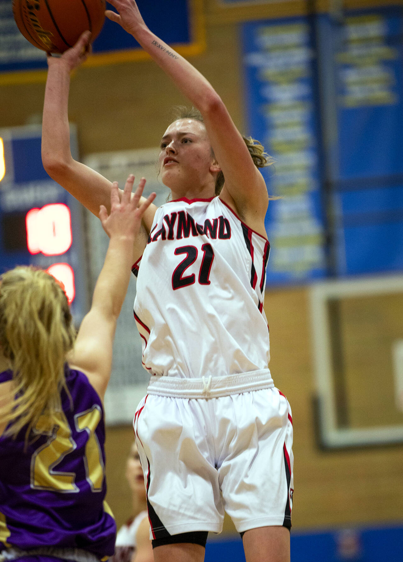 PHOTO BY KEVIN MILLER Raymond senior guard Kyra Gardner (21) scored 24 points as Raymond advanced to the 2B District 4 title game with a 51-45 win over Onalaska on Tuesday in Kelso. It’s the first time Raymond has reached the district title game since 1991.