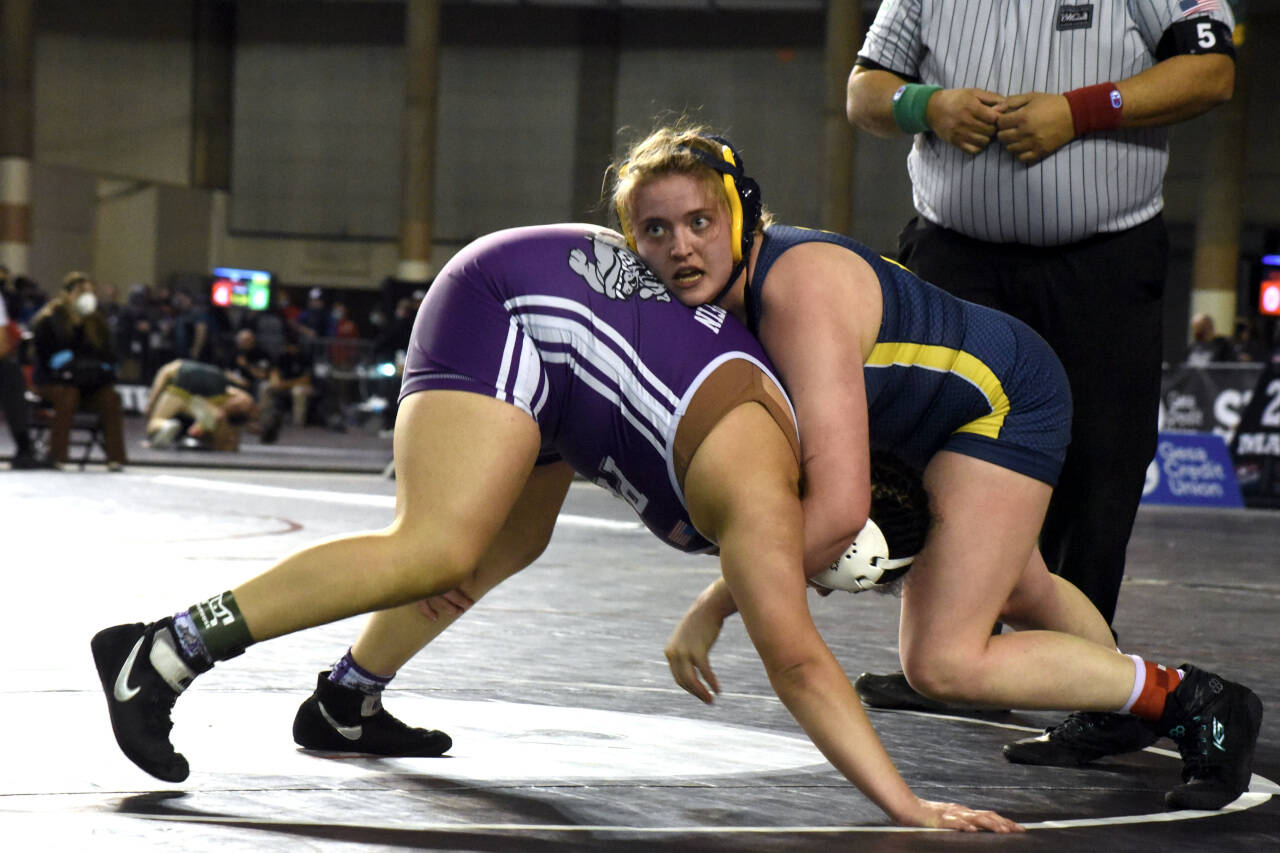 PHOTO BY SUE MICHALAK BUDSBERG Aberdeen’s Katie Gakin, right, competes at the Mat Classic XXXII state-championship tournament on Friday at the Tacoma Dome.