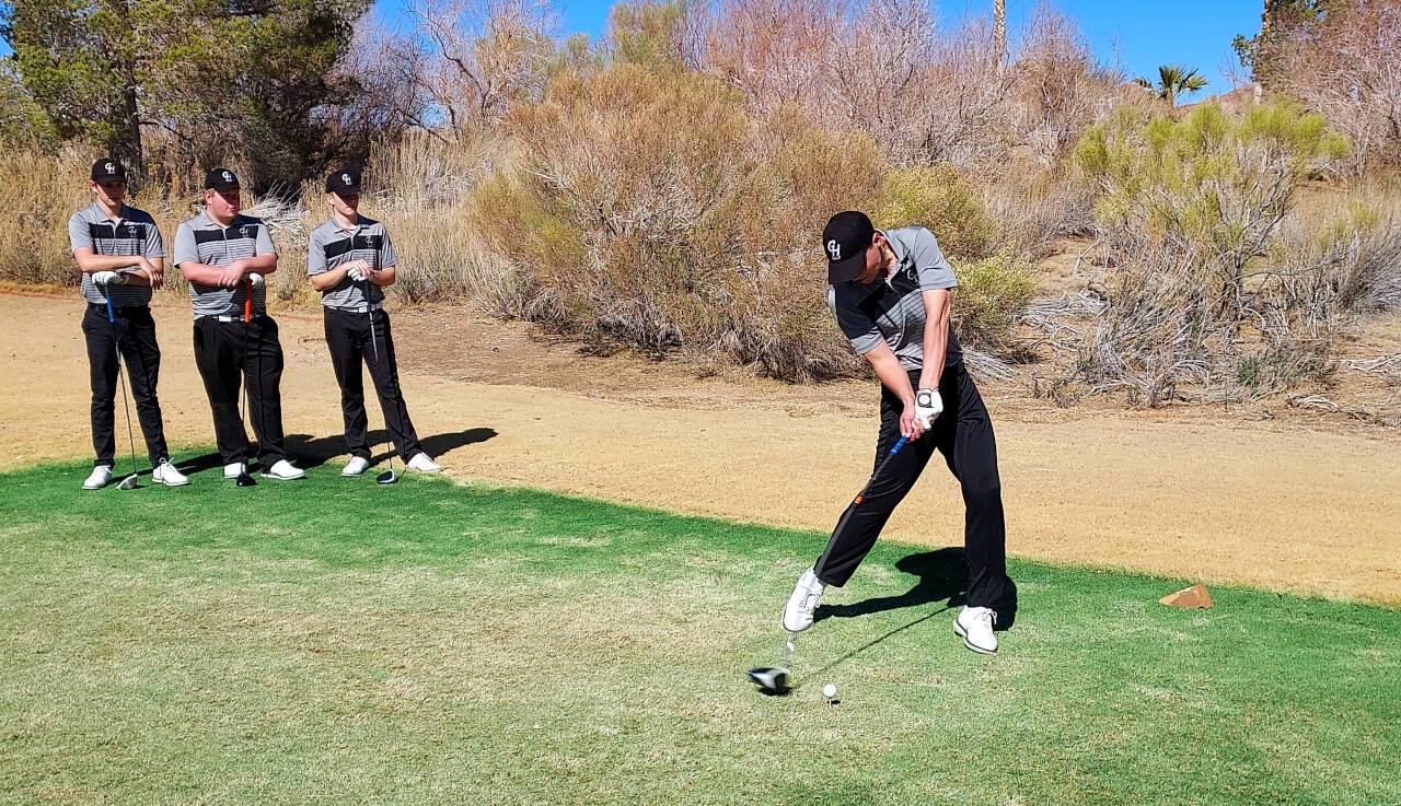 SUBMITTED PHOTO Grays Harbor College’s Michael Jump tees off as his teammates look on during the Las Vegas Shootout on Tuesday at the Boulder Creek Golf Club in Boulder Creek, Nevada.