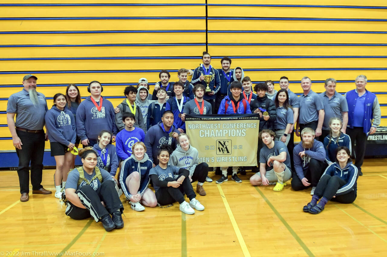 SUBMITTED PHOTO The Grays Harbor College wrestling team poses for a photo at the conclusion of the NCWA Northwest Conference Championships on Saturday at Aberdeen High School. GHC won 12 individual titles at the meet.