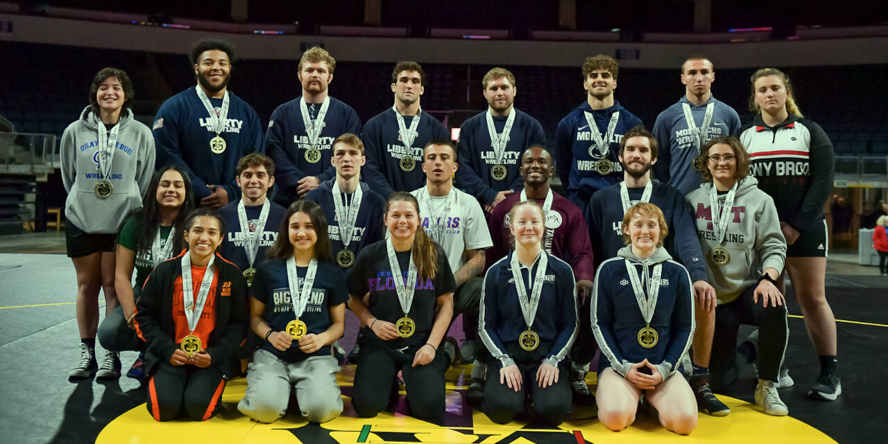 JIM THRALL | MATFOCUS.COM NCWA individual champions pose for a photo at the conclusion of the NCWA National Championships on Saturday in Allen, Texas. Included are Grays Harbor College’s Jocelyn Fierro (back row, far left), Tatum Pine (front row, second from right) and Grace Miller (front row, far right).
