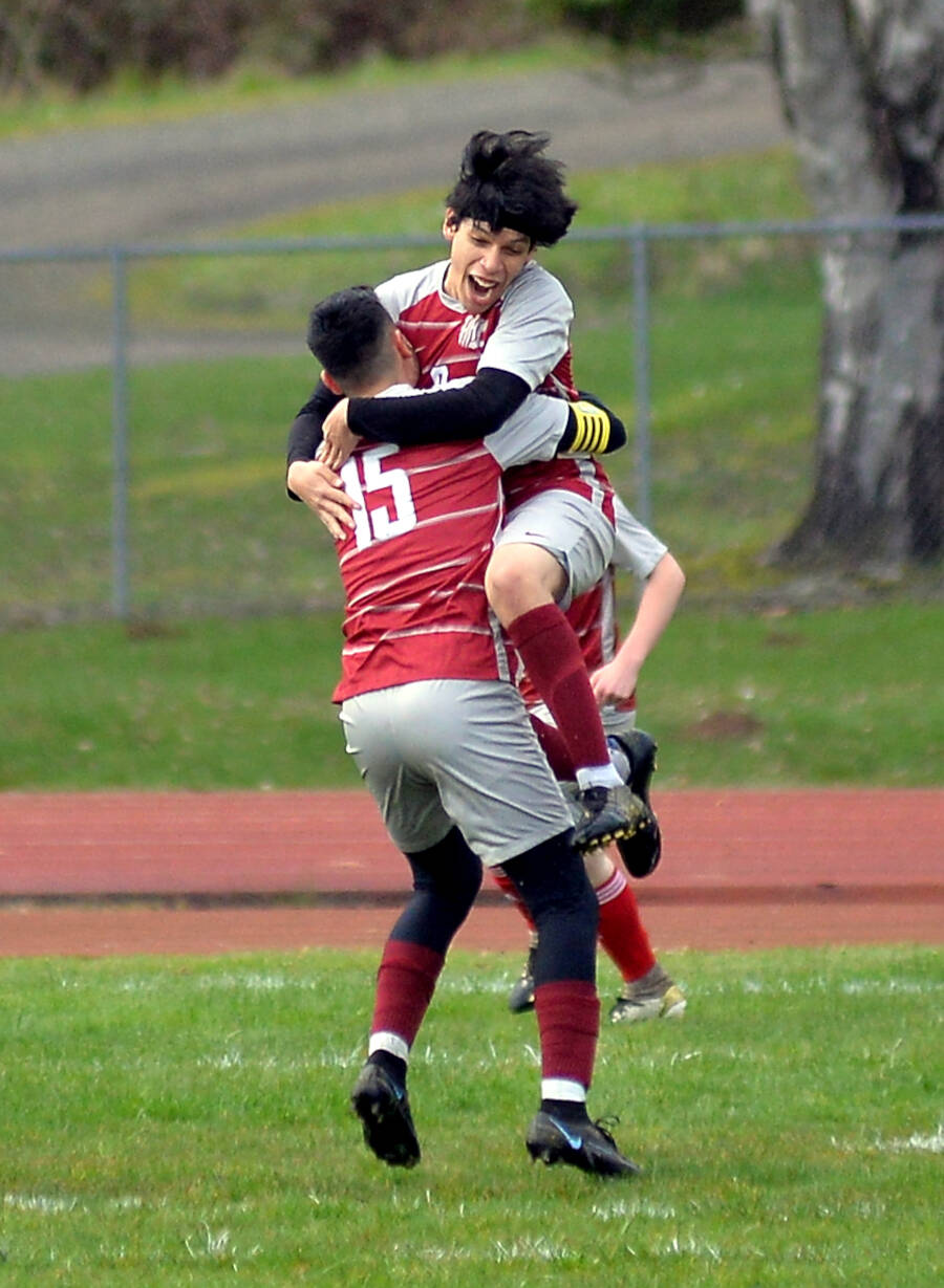 RYAN SPARKS | THE DAILY WORLD Hoquiam midfielder Rene Garcia celebrates with Roman Bedolla (15) after scoring a goal in the first of against Montesano on Tuesday in Hoquiam.