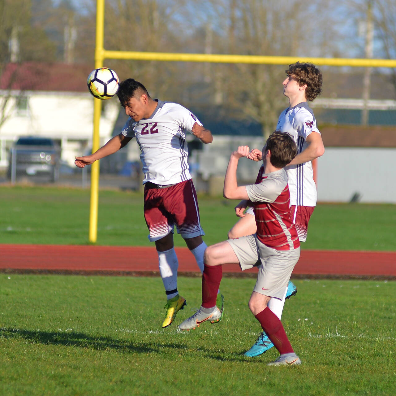 RYAN SPARKS | THE DAILY WORLD Montesano’s Daniel Vasquez (22) heads the ball forward during the Bulldogs’ 3-1 win on Tuesday at Sea Breeze Oval in Hoquiam.