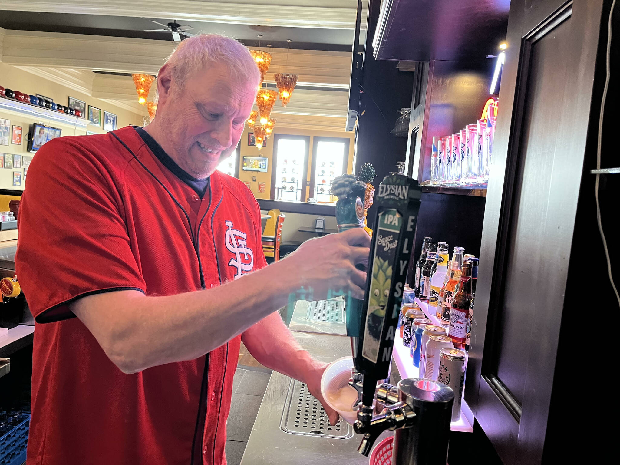 Matthew N. Wells | The Daily World
Tom Sutera, owner of Game Day Sports Bar and Grill — 212 S. I St. in Aberdeen — pours a Kona Brewing Big Wave Golden Ale at the start of business late Thursday morning, March 31, 2022.