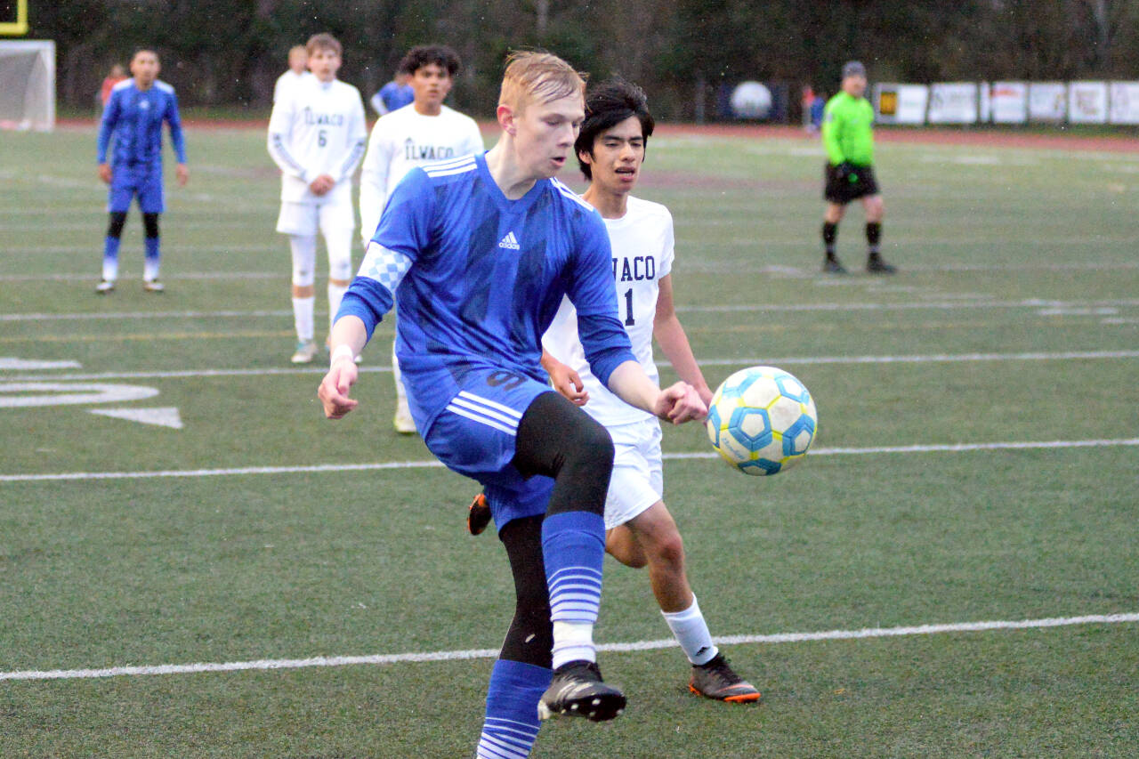 RYAN SPARKS | THE DAILY WORLD Elma senior forward Canon Seaberg, left, scored three goals to lead the Eagles to a 5-0 victory over Ilwaco on Wednesday at Montesano High School.