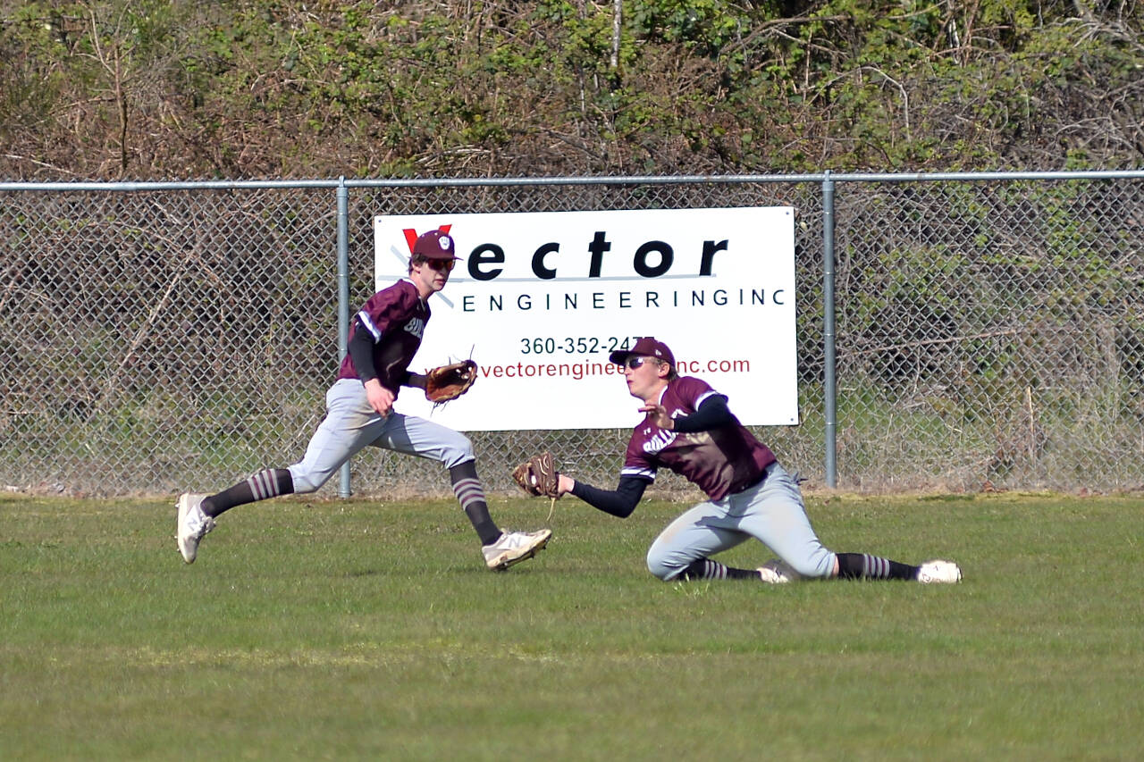 RYAN SPARKS | THE DAILY WORLD Montesano right fielder Tyler Johansen (12) makes a diving catch in the first game of a doubleheader against Elma on Tuesday in Elma.