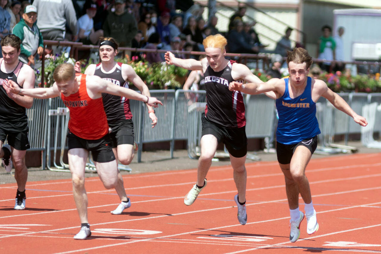 ALEC DIETZ | THE CHRONICLE Ocosta’s William Idso (second from right) races against Napavine’s Lucas Dahl (left) and Rochester’s Talon Betts in the 100 meters at the Chehalis Activators Classic on Saturday at WF West High School.