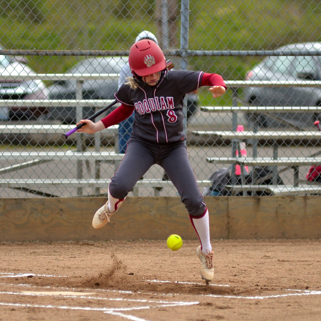 RYAN SPARKS | THE DAILY WORLD Hoquiam’s Graci Bonney-Spradlin jumps out of the way of a pitch during a doubleheader against the Eatonville Cruisers on Tuesday in Hoquiam.