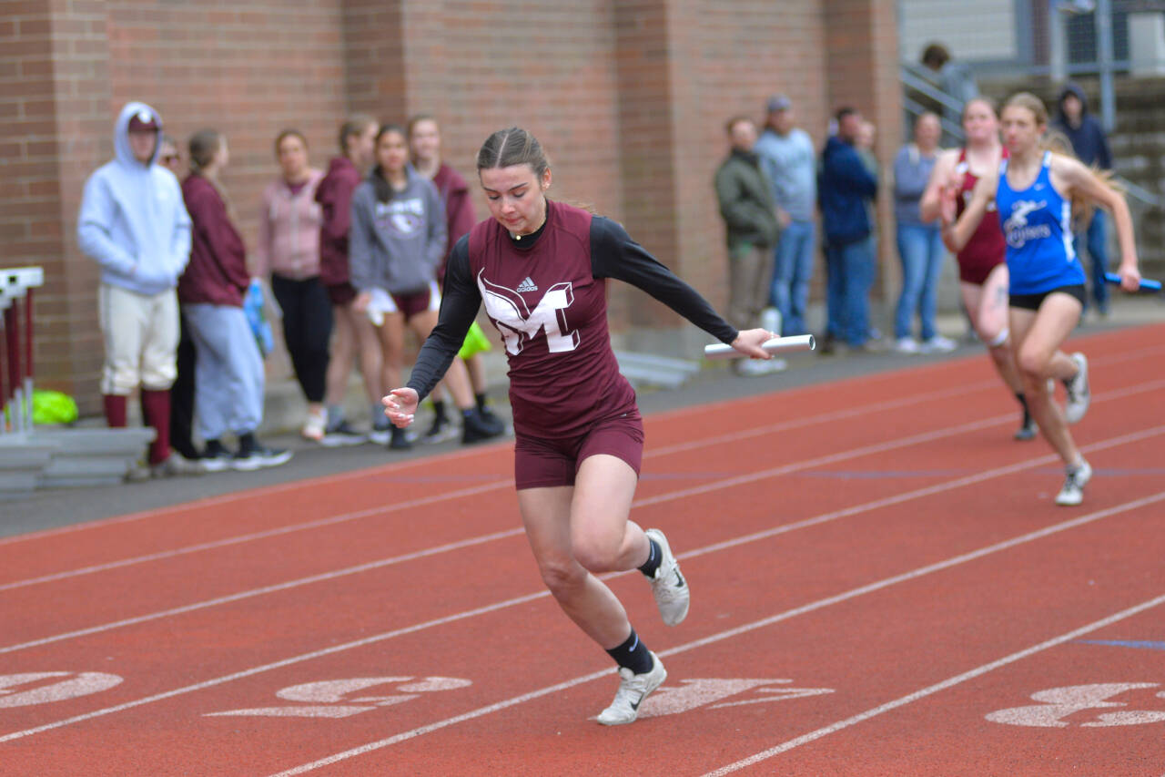 RYAN SPARKS / THE DAILY WORLD
Montesano’s Jaiden Morrison crosses the finish line to give Montesano a victory in the girls 4x100 meter relay during the 1A Evergreen Sub-District Championships on Friday, May 13, 2022, in Montesano.