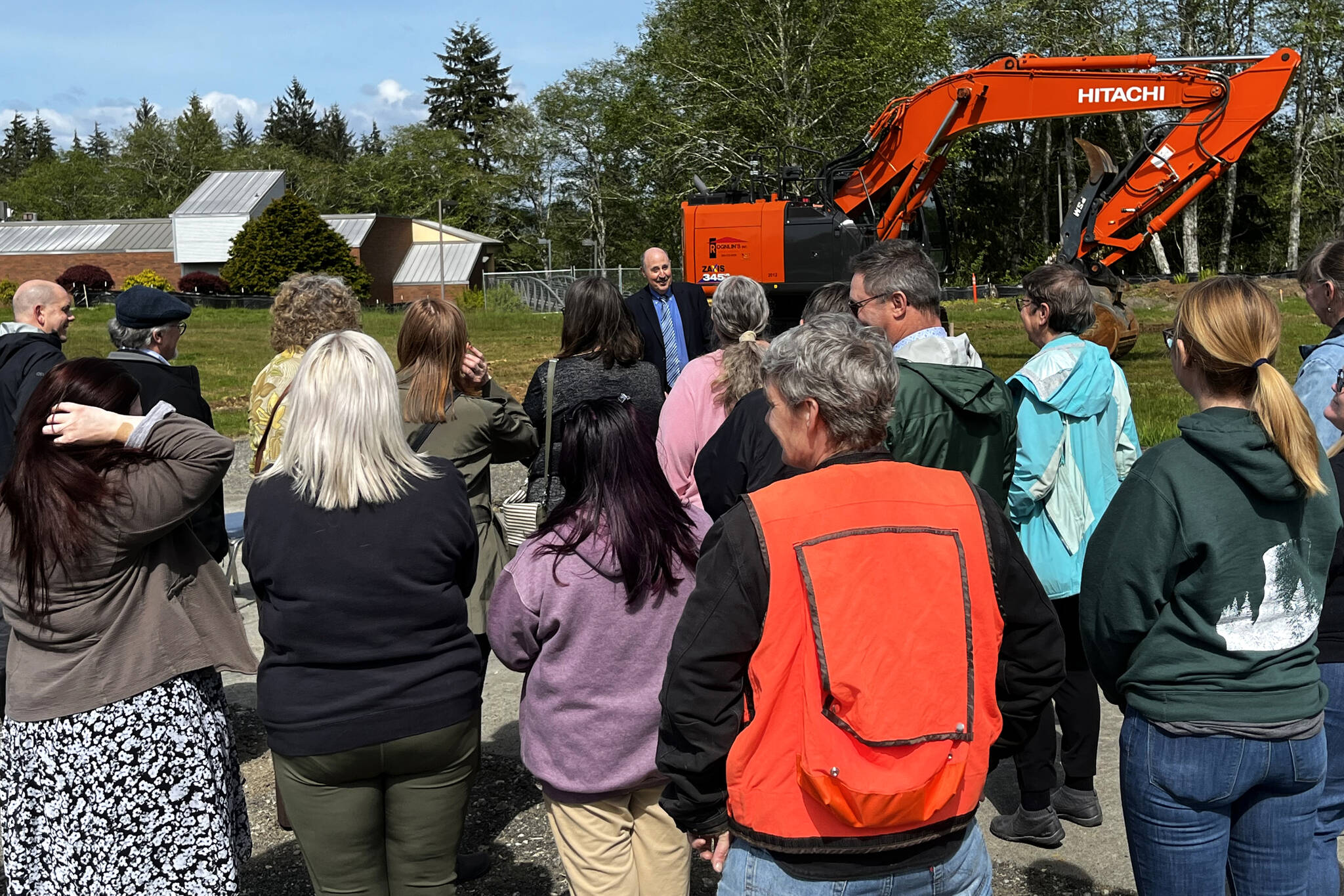 Allen Leister | The Daily World 
Audience members gather to listen to Grays Harbor College Board President Ed Brewster, as he explains details of the Student Services & Instruction Building project. The project is set to be completed in fall 2023.