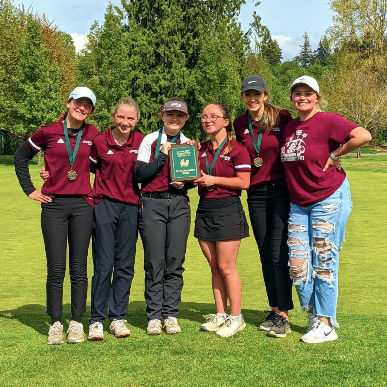 PHOTO BY SHARON GODFREY The Montesano girls golf team of (from left) Maggi Kupka, Jessie LaLonde, Iza Cope, Hailey Blancas, Audree Dohrmann and Kelcey Davis won the 1A District 4 team championship on Tuesday at Tumwater Valley Golf Course. The Bulldogs were led by Blancas, who won the individual title by two strokes with a score of 170.