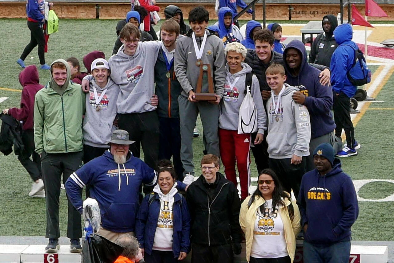 PHOTO COURTESY OF DENNIS NELSON The Aberdeen Bobcats boys track and field team took second place at the WIAA 2A State Championships on Saturday in Tacoma. Pictured are (front row, from left) Coach Todd Bridge, Head Coach Desiree Glanz, Coach Steve Reed, Coach Ivy Lyles, Coach Brandyn Brooks. Back row (from left): Will Boling, Henry Nelson, Collin Babineau, Andrew Troeh, Julian Campos, Jonas Urbina, Liam Hiekkila, Trey Anderson and JaBron Brooks.