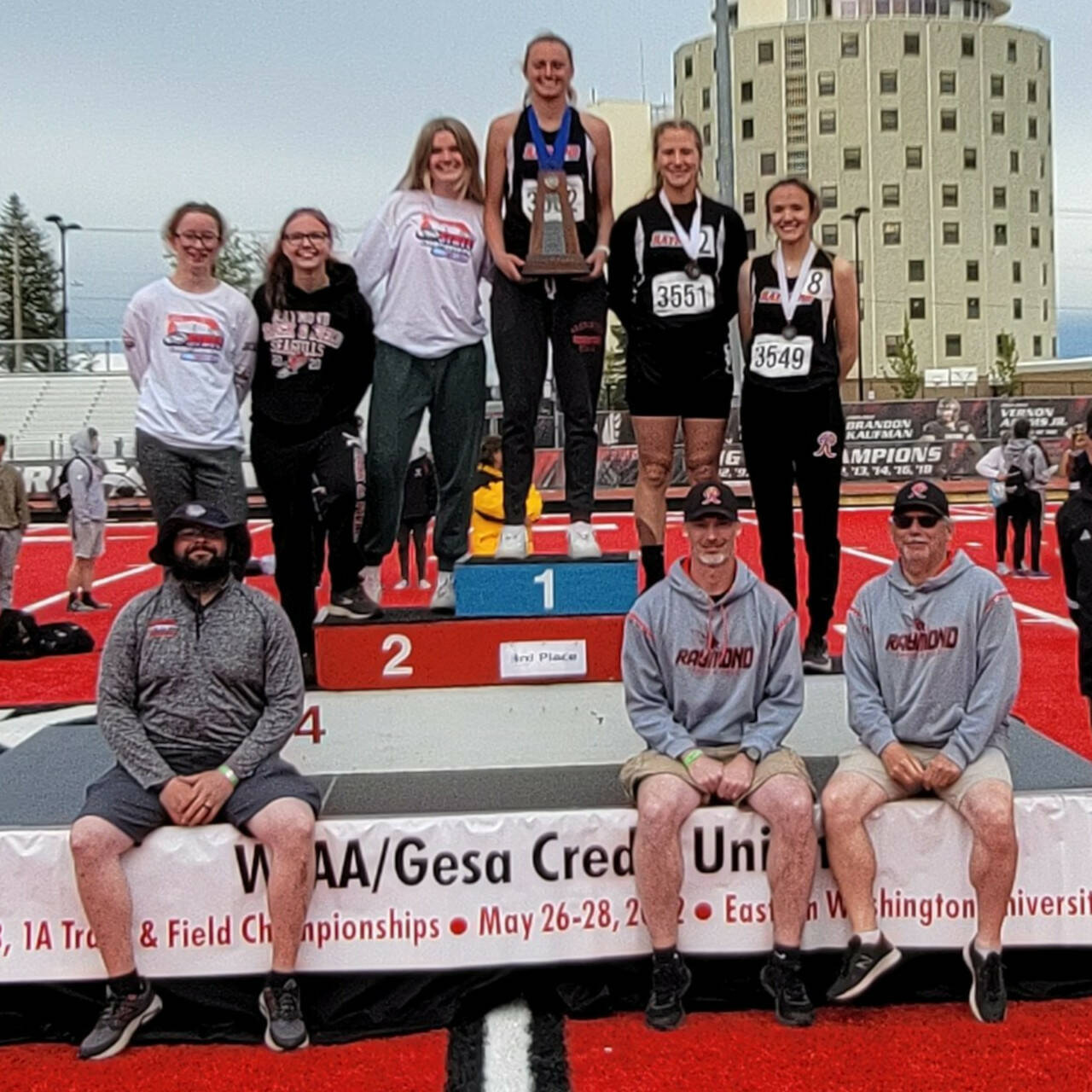 PHOTO COURTESY OF RAYMOND ATHLETICS The Raymond girls track and field team pose with their third-place trophy at the conclusion of the WIAA 2B State Track and Field Championships on Saturday at Eastern Washington University in Cheney.