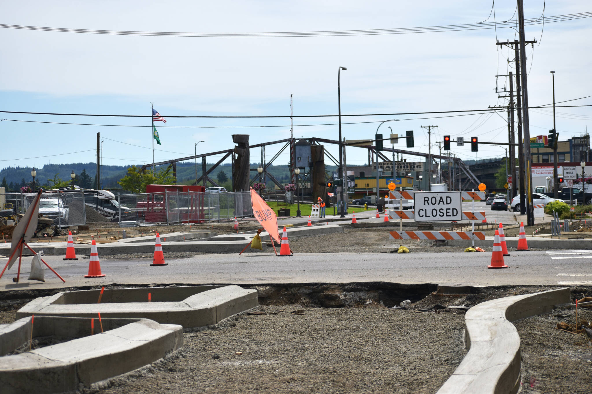 The view from outside Twin Star Credit Union  416 E. Market St.,  shows part of the roundabout construction site, the closure of F Street just south of East Market Street, and the changing changing terrain from the work involved in order to build the roundabout. Nick Bird, city engineer for the City of Aberdeen, warns pedestrians to avoid walking through the construction zone, citing concerns for their safety. (Matthew N. Wells | The Daily World)