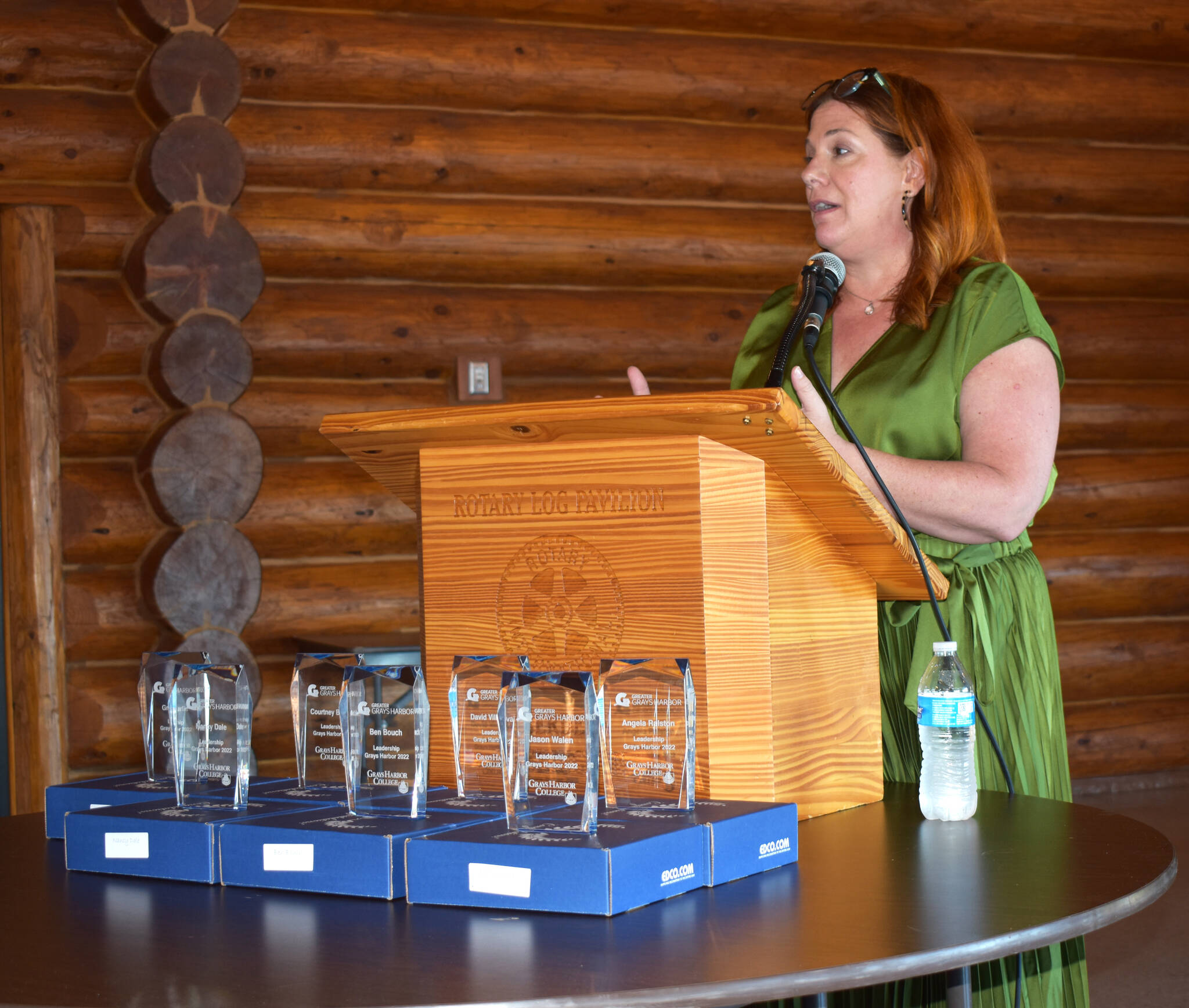 Lynnette Buffington, CEO for Greater Grays Harbor, Inc. talks about how the recruitment and retention issues that face local  police and fire departments also extend into the private sector during the business forum luncheon on Tuesday, July 26, at Rotary Log Pavilion. (Matthew N. Wells | The Daily World)