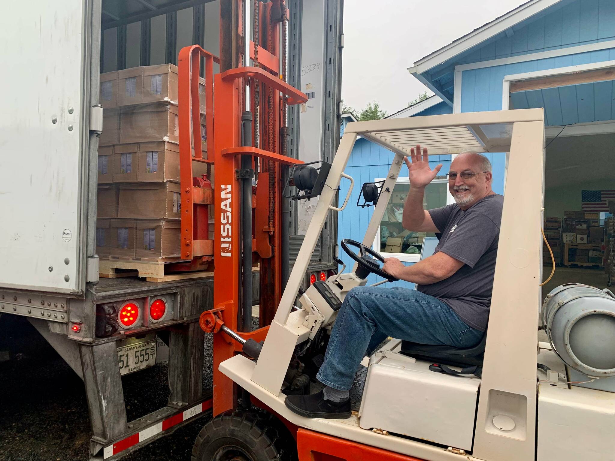 Photo Courtesy of Miriam Jones
Jeff Moyer, executive director for North Beach Senior Center of Ocean Shores, drives a forklift on Wednesday morning, Aug. 3, 2022, in order to help transport 40,000 pounds of nonperishable items that came 900 miles from The Church of Jesus Christ of Latter-day Saints in Salt Lake City, Utah.