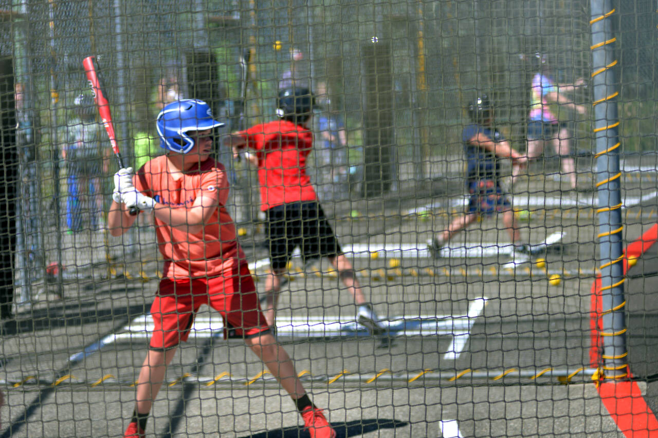 RYAN SPARKS | THE DAILY WORLD 
Several budding big-leaguers take to the cages at the grand reopening of Mr. T’s Bat-O-Rama at the Olympic Stadium Complex in Hoquiam on Sunday, Aug. 7, 2022.