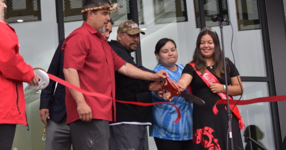Matthew N. Wells | The Daily World 
Quinault Indian Nation President Guy Capoeman (left) cuts the Quinault Wellness Center ceremonial ribbon with other members of the Quinault Tribe on Aug. 31, 2022, in Aberdeen. The treatment center is excepted to have its grand opening on Oct. 3.