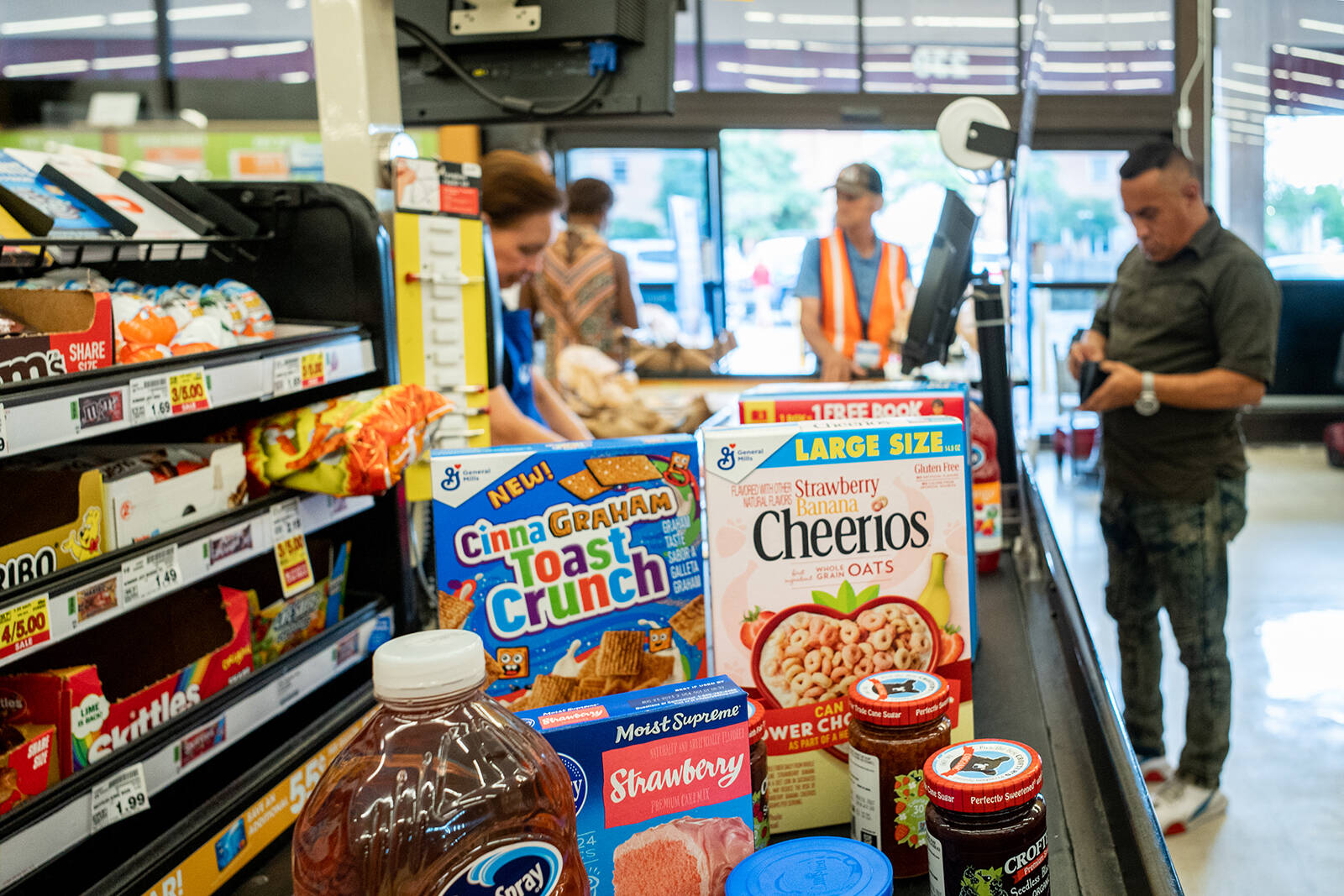 Brandon Bell | Getty Images | TNS | File Photo 
A cashier processes a customer’s order in a Kroger grocery store on July 15, 2022, in Houston.