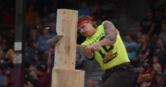 photos by Matthew N. Wells | The Daily World
Michael Pakos heaves an axe at the wood — at least 12 inches in diameter — during the springboard chop on Saturday, Sept. 10, 2022, at the Loggers Playday Show at Olympic Stadium. Pakos finished third in the event with a time of 1:34:44. Tristan VanBeek won the event with a time of 1:16:08. According to the Hoquiam Loggers Playday program, it’s one of the favorite events that takes place during Hoquiam Loggers Playday.