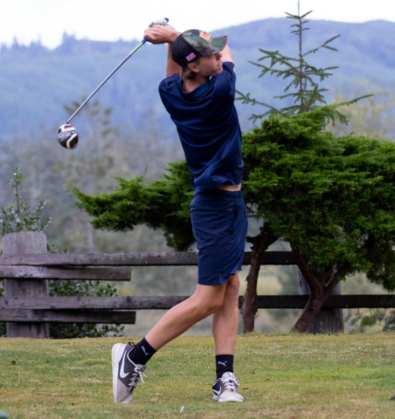 PHOTO BY PATTI REYNVAAN Aberdeen’s Charlie Ancich tees off during a match against Hoquiam on Thursday at the Grays Harbor Country Club in Cosmopolis.