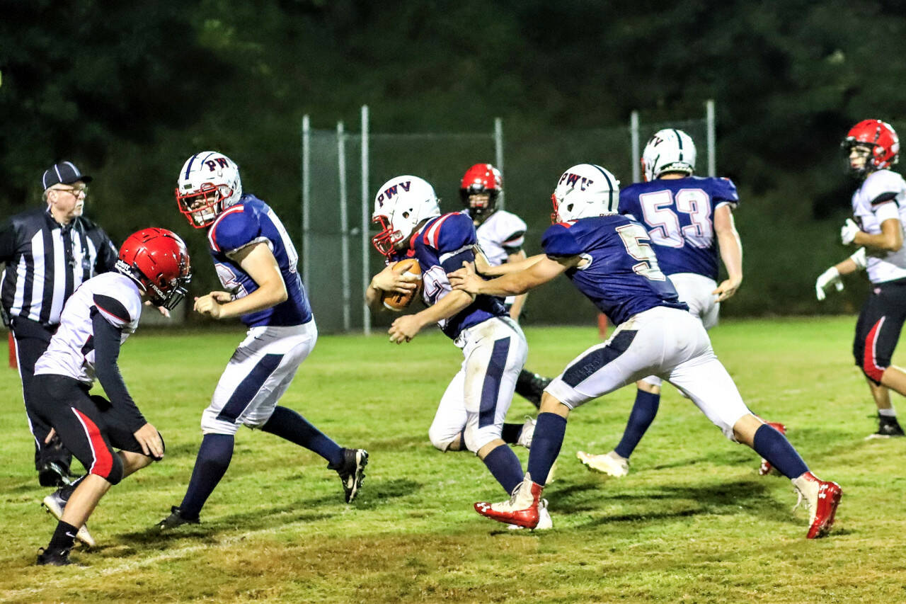 PHOTO BY LARRY BALE Pe Ell-Willapa Valley running back Blake Howard, center, and Wil Clements (5), seen here in a game against Wahkiakum on Sept. 16, 2022, will face top-ranked Napavine on Friday, Sept. 23.