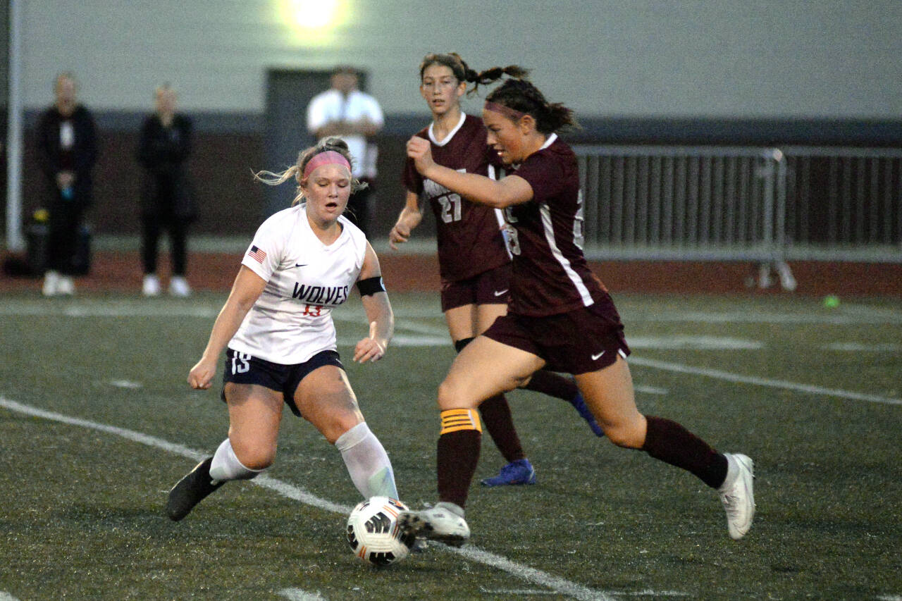 RYAN SPARKS | THE DAILY WORLD Montesano midfielder Jaiden King, right, dribbles against Black Hills’ Mia Oniskey during the Bulldogs’ 6-1 win on Thursday, Sept. 22, 2022 at Jack Rottle Field in Montesano.