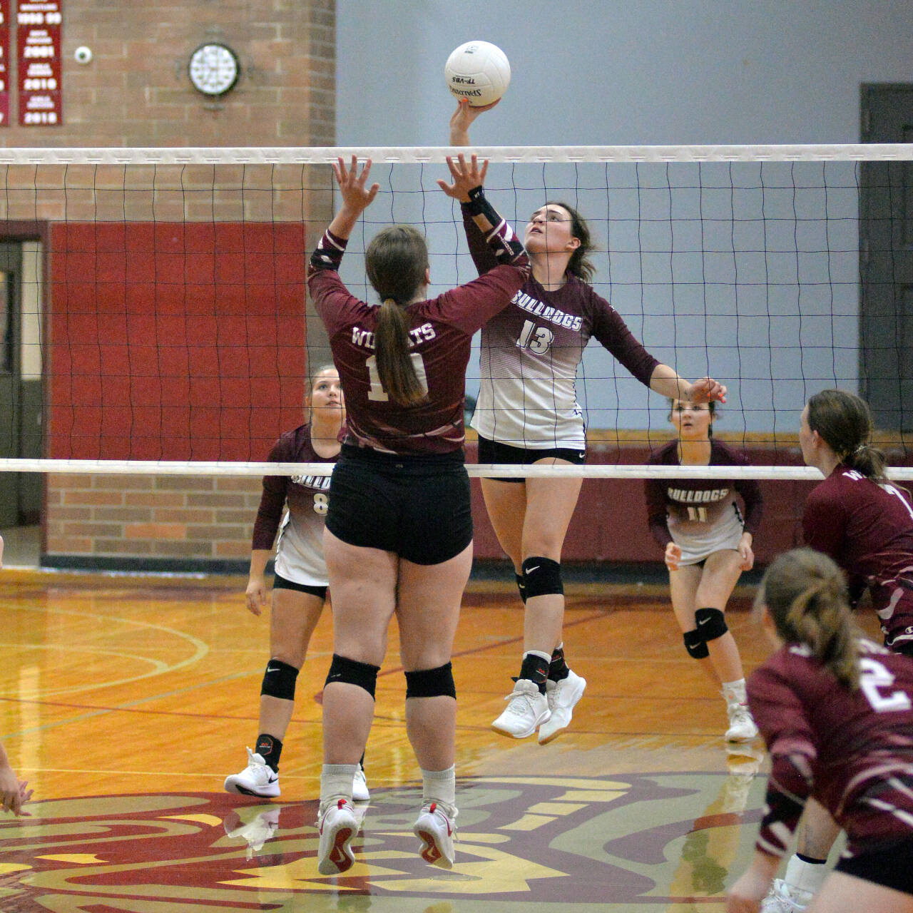 RYAN SPARKS | THE DAILY WORLD Montesano middle blocker Addie Winter (13) puts up a drop shot against Ocosta’s Alexia Bradley during the Bulldogs’ 3-0 win in a non-league match on Wednesday in Montesano.