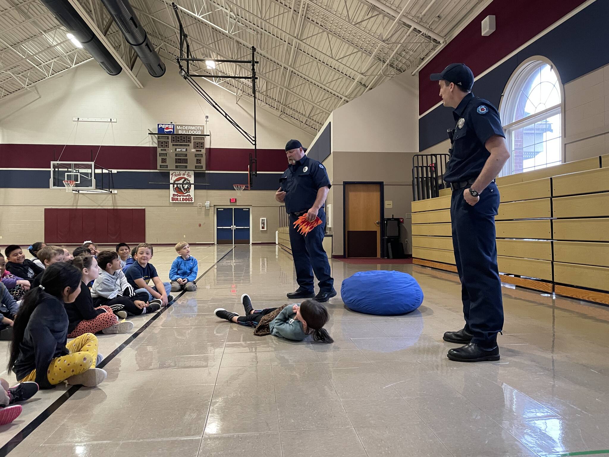 Michael S. Lockett | The Daily World
A second-grader at McDermoth Elementary School demonstrates their stop-drop-and-roll technique during a Fire Prevention Week presentation from the Aberdeen Fire Department on Monday.