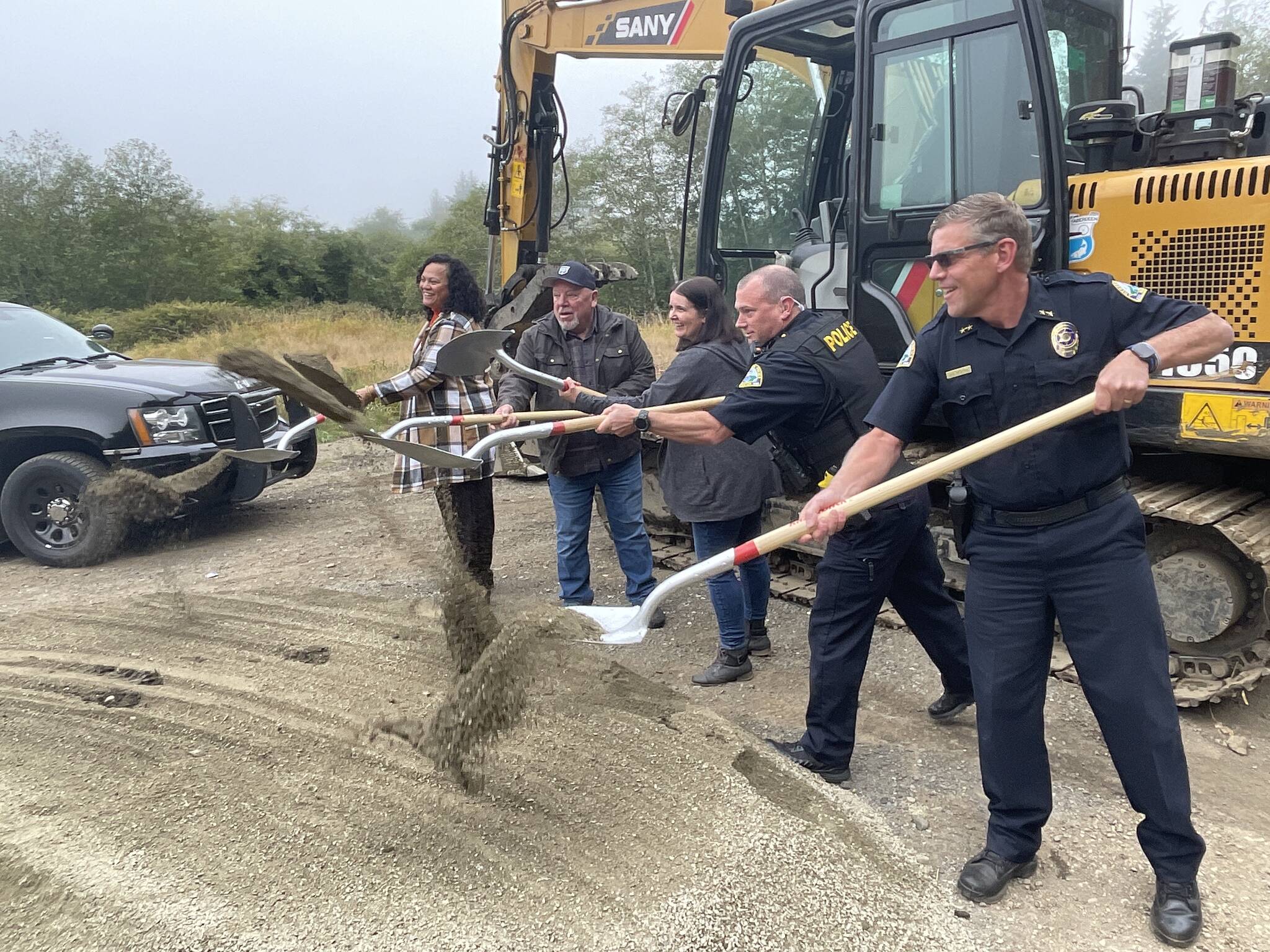 Michael S. Lockett | The Daily World 
Aberdeen police and city officials perform the ceremonial groundbreaking for a new firing range on Oct. 7, 2022, dedicated to a former officer with the department.