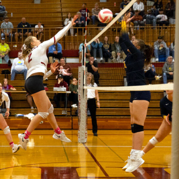 PHOTO BY PATTI REYNVAAN
Hoquiam’s Kristina Goulet, left, records a kill during a straight-set victory over Aberdeen on Monday, at Hoquiam High School.