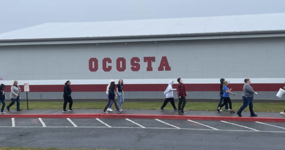 Michael S. Lockett / The Daily World 
Students at Ocosta Junior-Senior High School walk to the adjacent vertical tsunami shelter on Oct. 20 as part of the Great ShakeOut, a statewide tsunami drill.