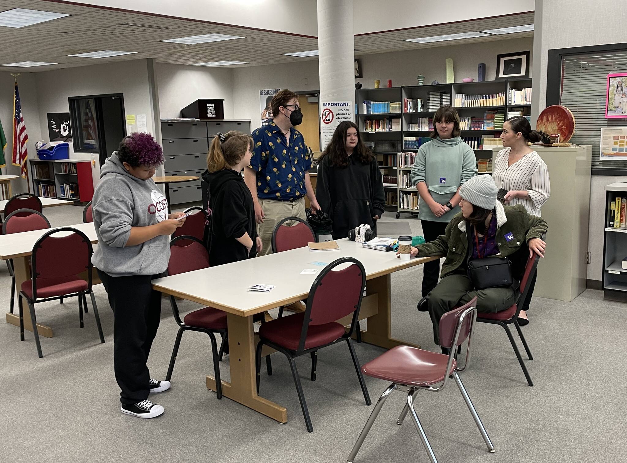 Andrea Mirante, furthest right, Director of After School Programs for the Ocosta School District, talks to the drone club prior to the Great ShakeOut, a statewide tsunami drill, on Oct. 20 (Michael S. Lockett / The Daily World)