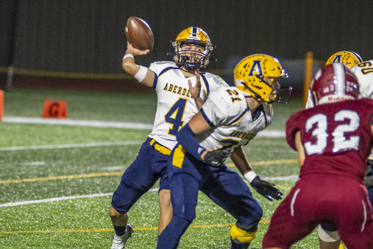 PHOTO BY ERIC TRENT 
Aberdeen quarterback Grady Springer (4) throws a pass during the Bobcats’ 42-15 loss to WF West on Thursday in South Bend.