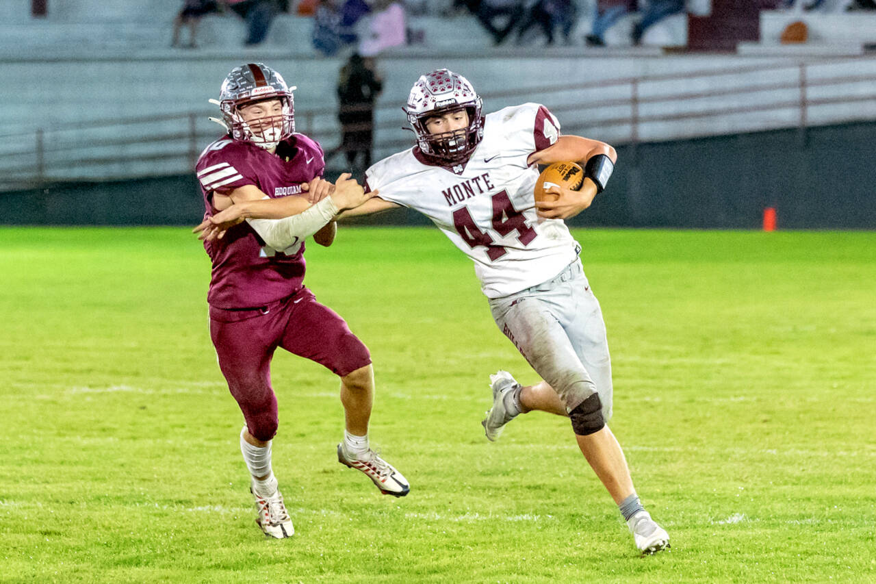 PHOTO BY SHAWN DONNELLY Montesano’s Gabe Bodwell (44) is chased by Hoquiam’s Zander Jump in a game from earlier this season. Monte will face Elma in the East County Civil War while Hoquiam takes on No. 6 Eatonville in the final week of the prep football regular season.