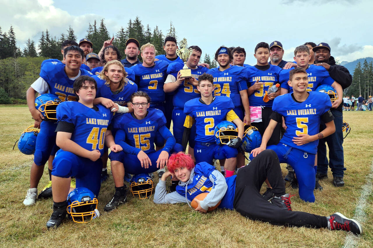RYAN SPARKS | THE DAILY WORLD The Lake Quinault Elks pose for a photo after winning the 1B Coastal League six-man championship with a 67-38 win over Northwest Christian on Saturday, Oct. 29, 2022 at Lake Quinault High School.