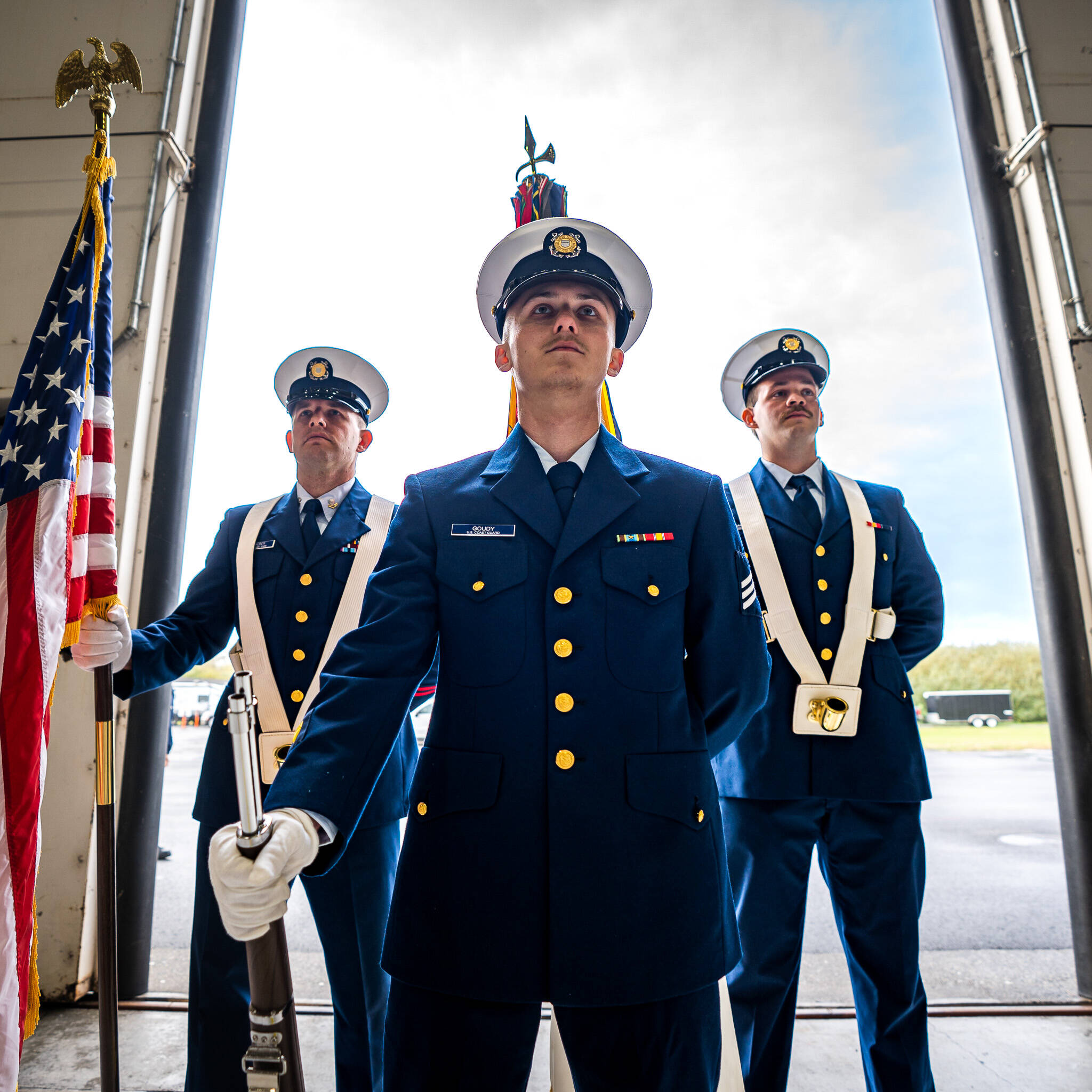 A color guard team stands during an establishment ceremony in Warrenton, Oregon, to formally establish Coast Guard Base Astoria Oct. 26, 2022. (Petty Officer 1st Class Travis Magee / USCG)